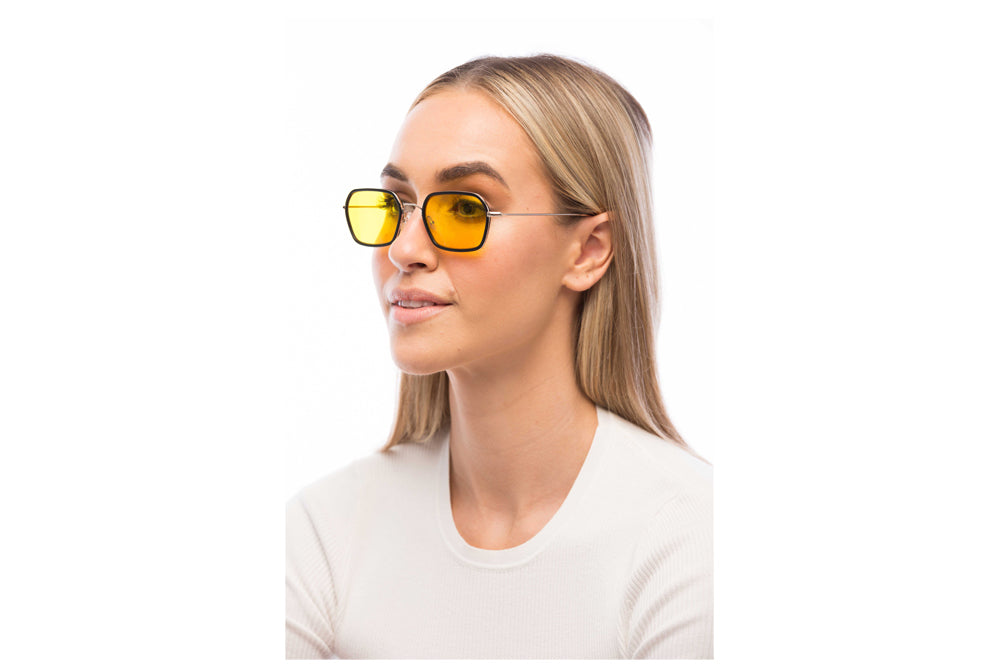 Woman Wearing Mac Light Sensitivity Glasses