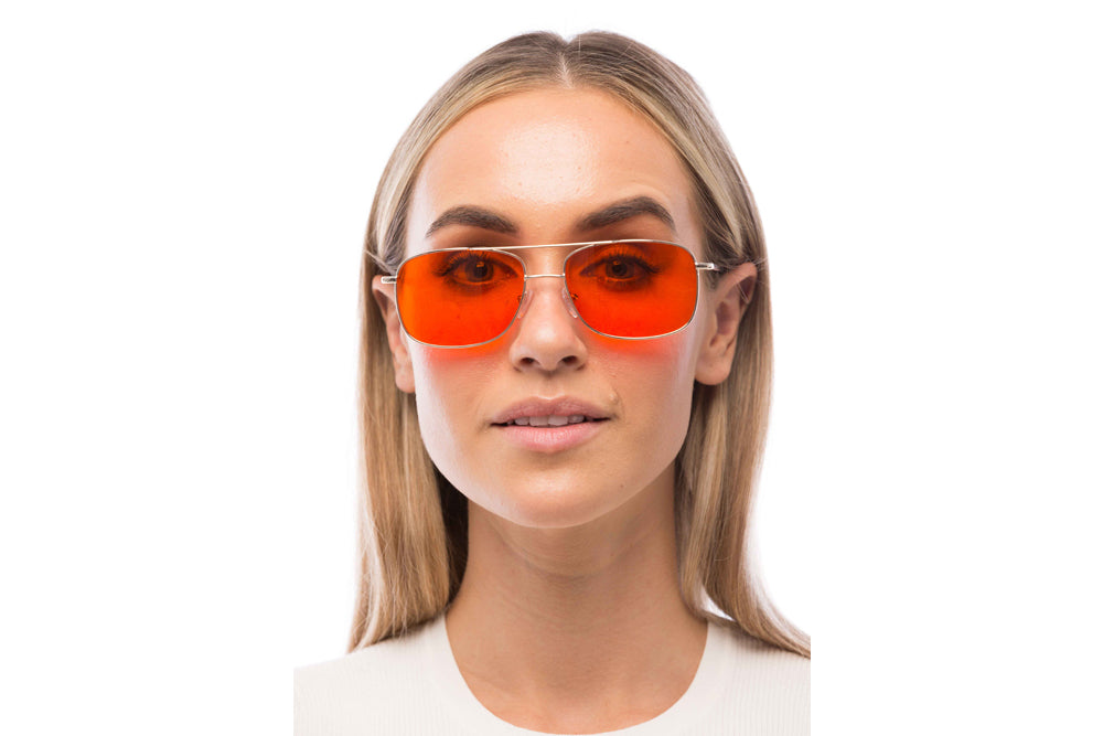 Woman Wearing Magnum Blue Light Blocking Glasses Readers
