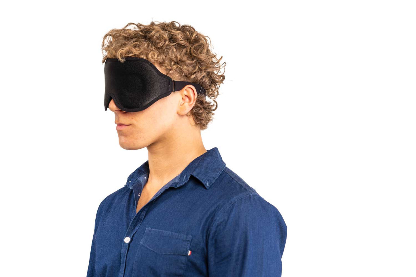 Man Wearing Blackout Contoured Sleep Mask
